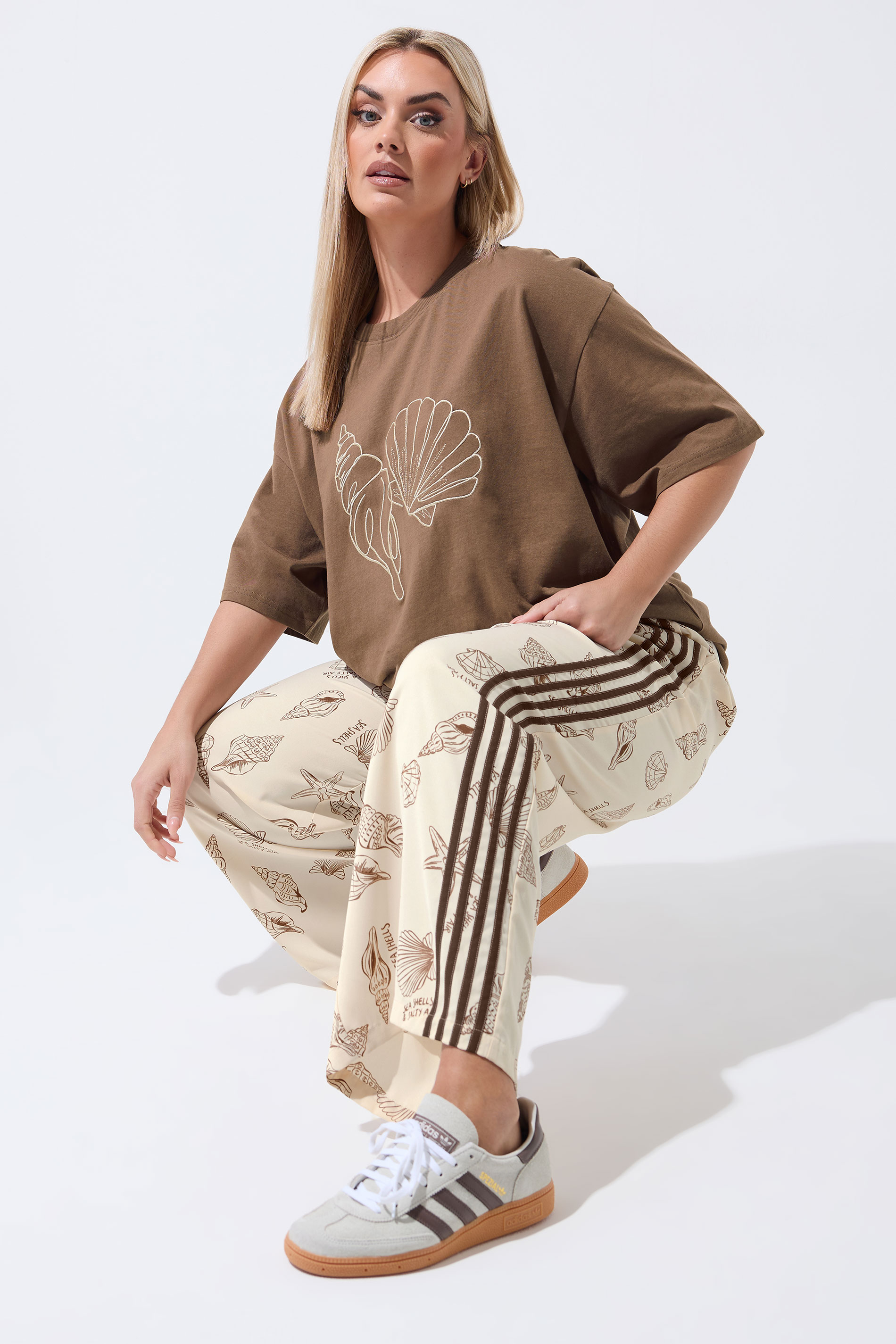 LIMITED COLLECTION Plus Size Nude Shell Print Wide Leg Trousers | Yours Clothing 1