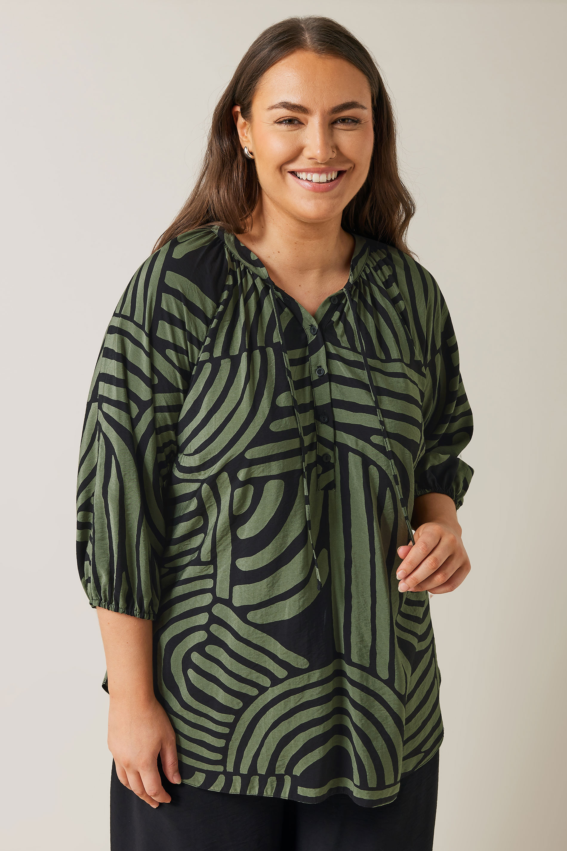 EVANS Plus Size Khaki Green Abstract Print Tie Neck Blouse | Evans 1