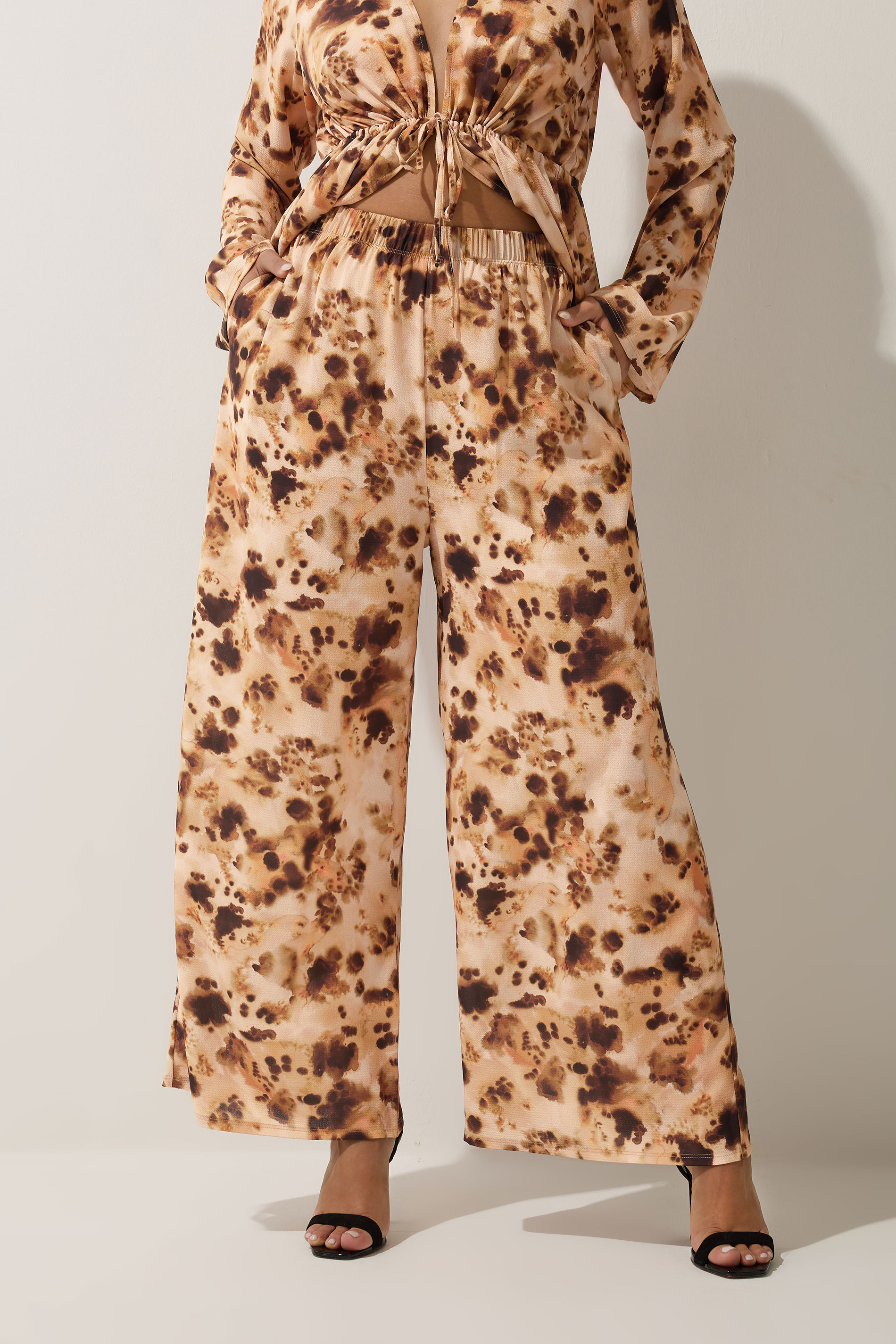 LIMITED COLLECTION Plus Size Brown Abstract Animal Print Wide Leg Trousers | Yours Clothing 1