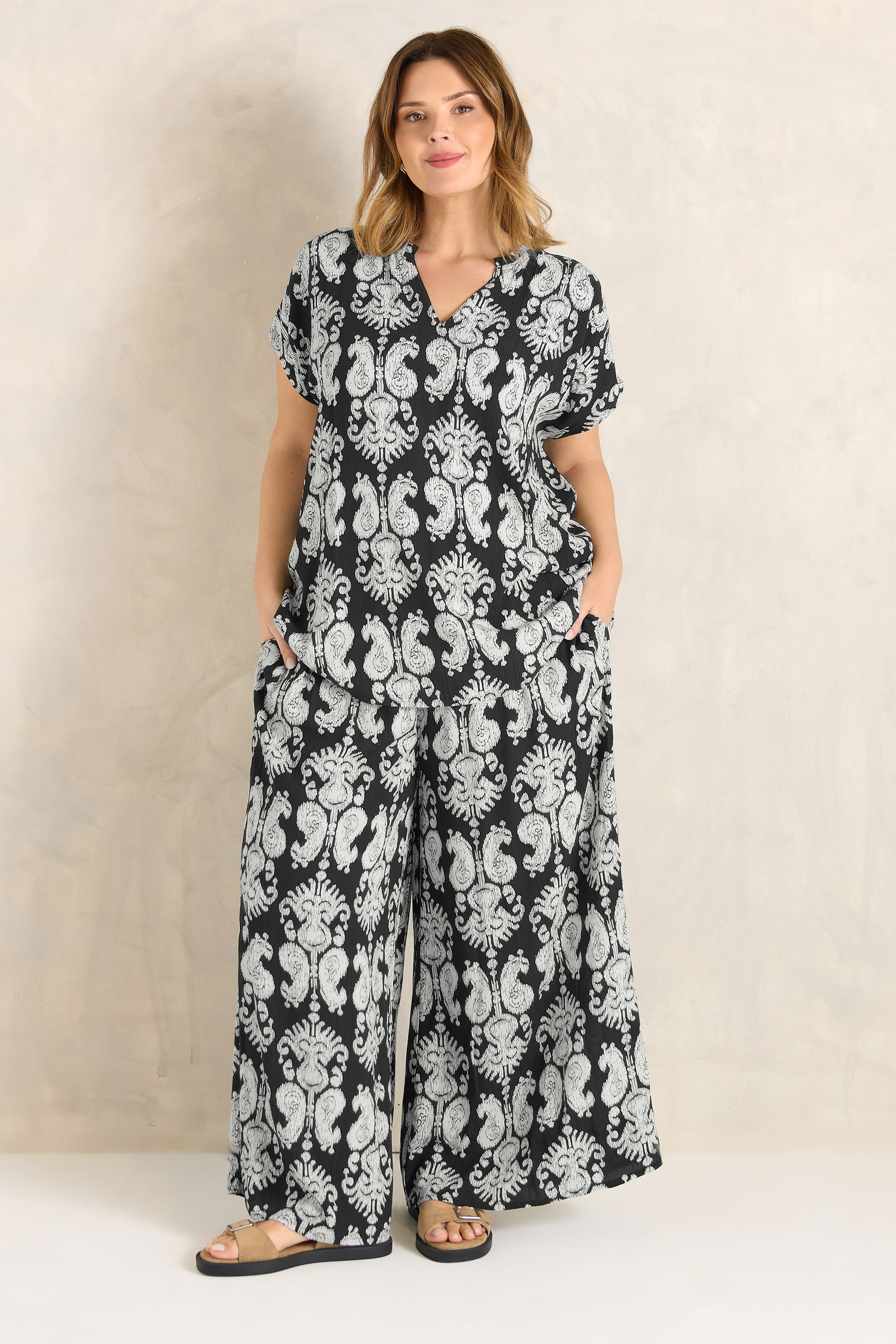 EVANS Plus Size Black Abstract Print Shirred Waist Trousers | Evans  1