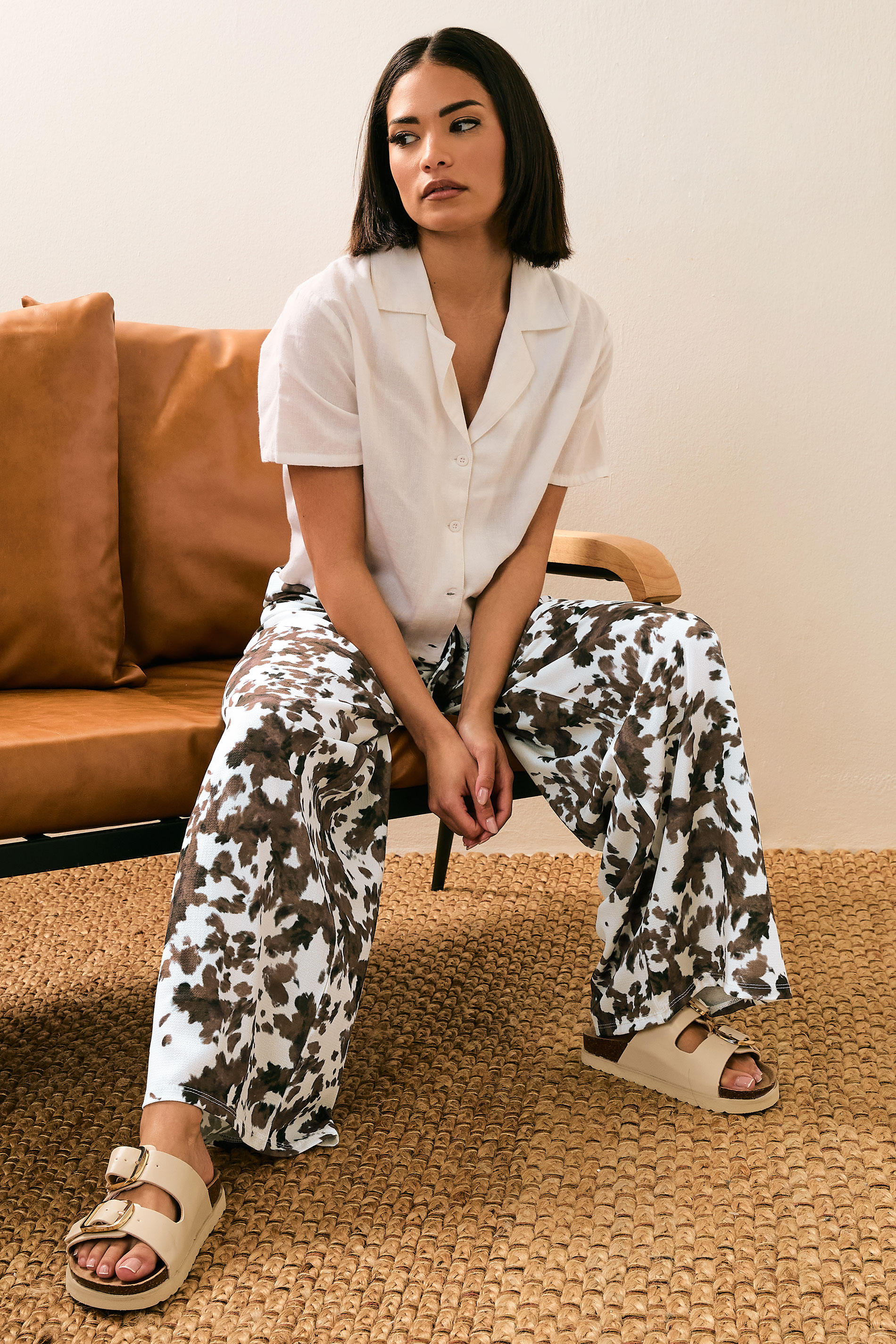 PixieGirl Petite Women's Brown Cow Print Wide Leg Trousers | PixieGirl 1