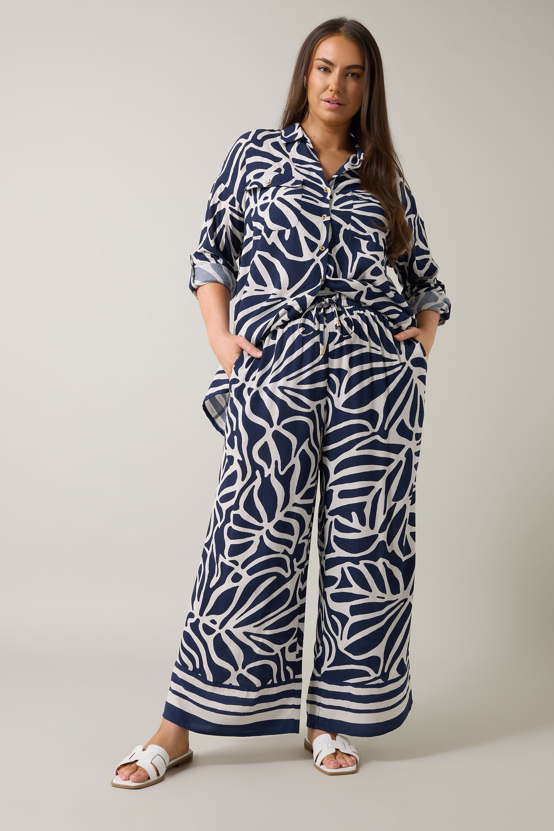 EVANS Plus Size Navy Blue Palm Border Print Trousers | Evans 2