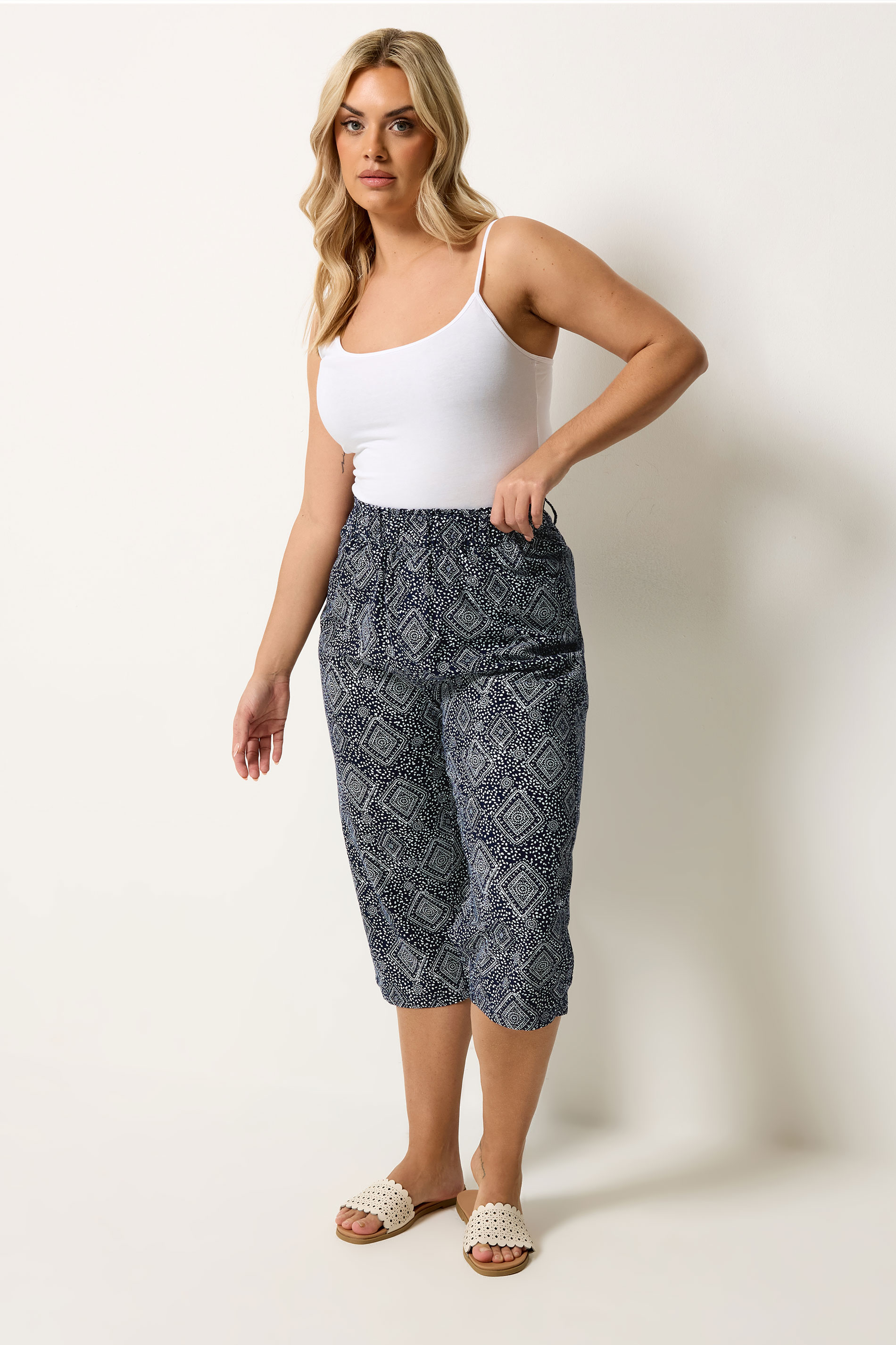 YOURS Plus Size Navy Blue Geometric Cool Cotton Cropped Trousers | Yours Clothing 1