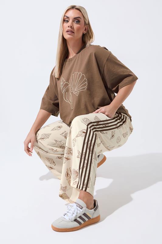 LIMITED COLLECTION Plus Size Nude Shell Print Wide Leg Trousers | Yours Clothing 1