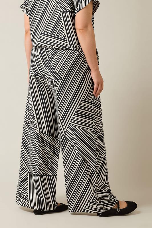 EVANS Plus Size Black Stripe Print Wide Leg Trousers | Evans 4