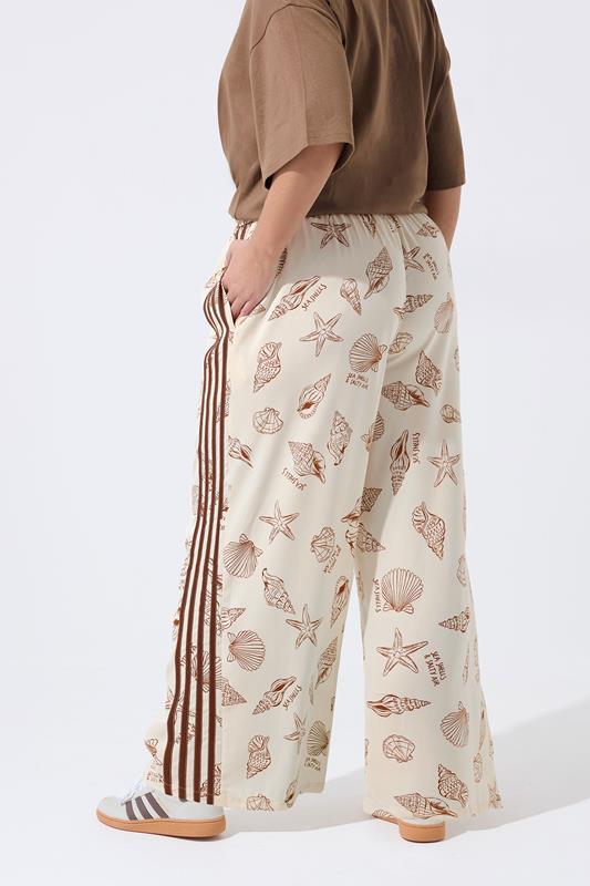 LIMITED COLLECTION Plus Size Nude Shell Print Wide Leg Trousers | Yours Clothing 5