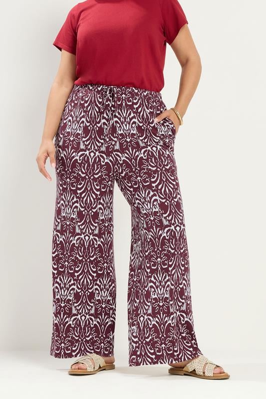 YOURS Plus Size Red Ikat Print Trousers | Yours Clothing 1