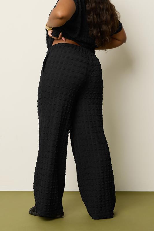 YOURS Plus Size Black Bubble Textured Wide Leg Trousers | Yours Clothing 2