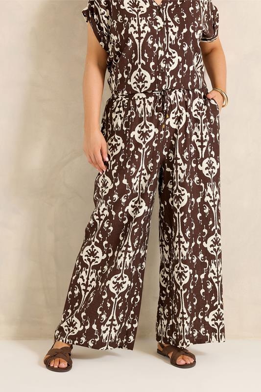 EVANS Curve Chocolate Brown Abstract Print Trousers