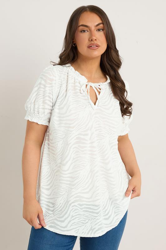 EVANS Plus Size White Burnout Print Tie Neck Blouse | Evans 1