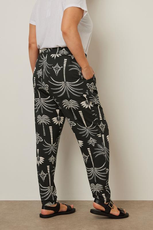 YOURS Plus Size Black Palm Print Balloon Trousers | Yours Clothing 4