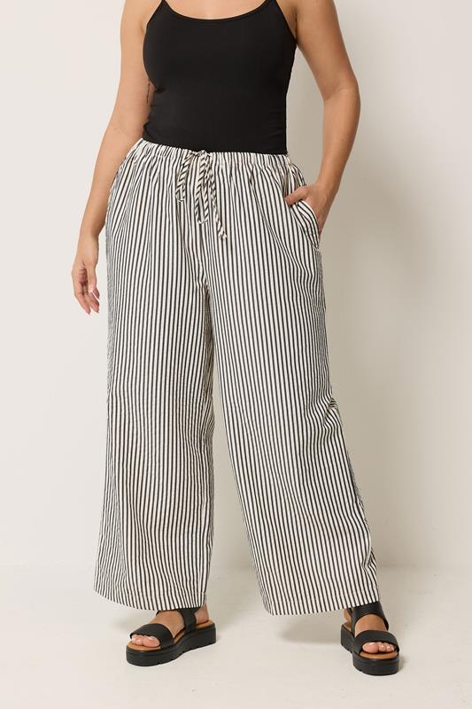 YOURS Plus Size Cream & Black Stripe Trousers | Yours Clothing 1