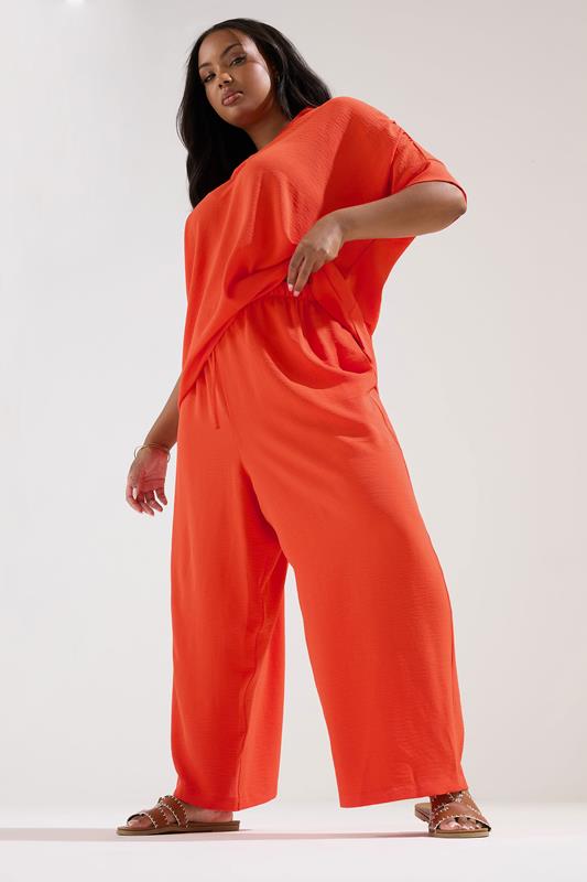 YOURS Plus Size Orange Tie Waist Wide Leg Trousers | Yours Clothing 1