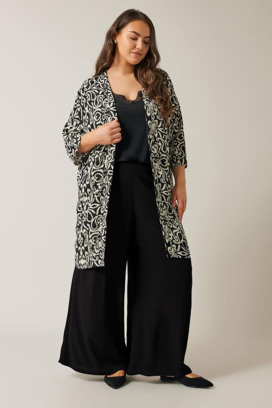 EVANS Plus Size Black Wide Leg Trousers | Evans 1