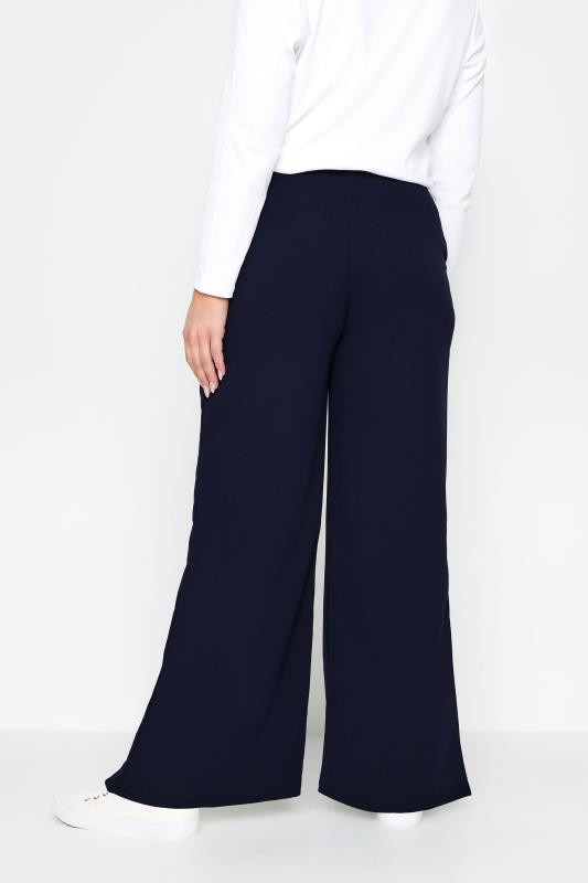 Navy blue stretch trousers with embroidered glitter star detail edging -  Horizons Lointains