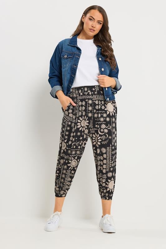 YOURS Plus Size Black Celestial Cropped Balloon Trousers | Yours Clothing 1