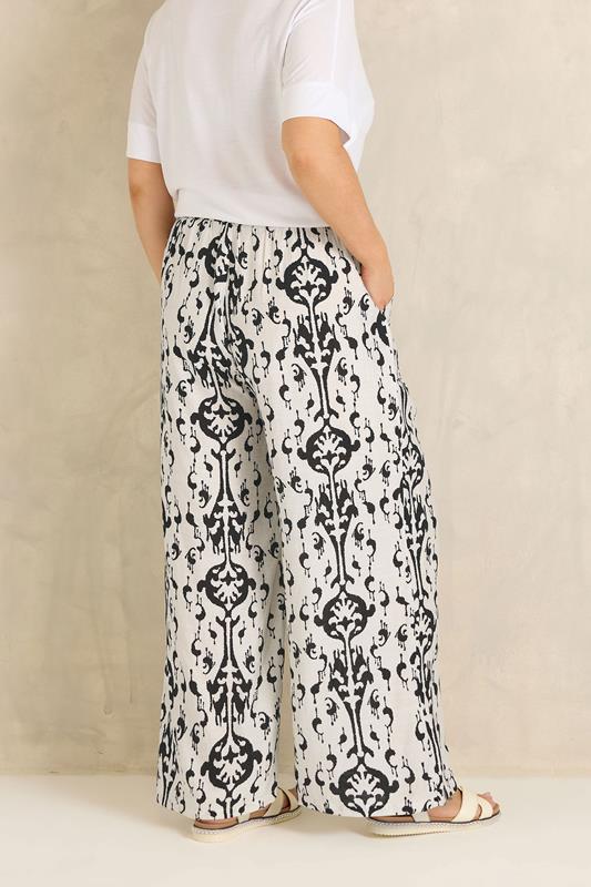 EVANS Plus Size White Abstract Print Wide Leg Trousers | Evans 4