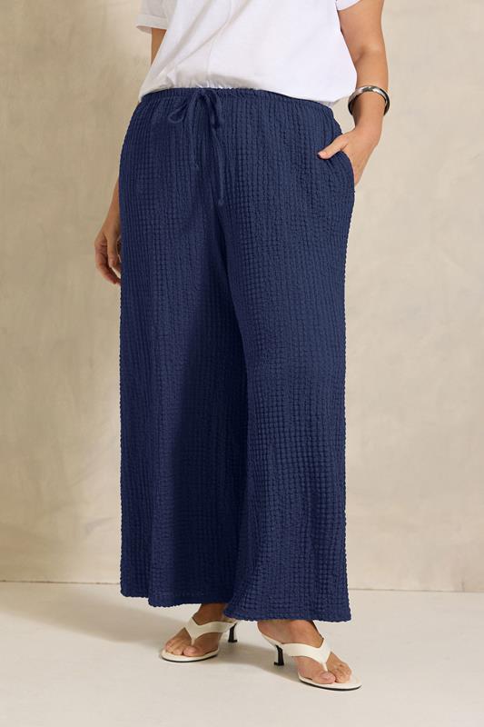 EVANS Plus Size Navy Blue Crinkle Wide Leg Trousers | Evans 1