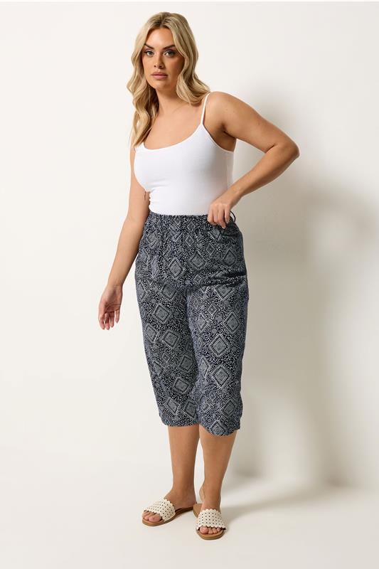 YOURS Plus Size Navy Blue Geometric Cool Cotton Cropped Trousers | Yours Clothing 1