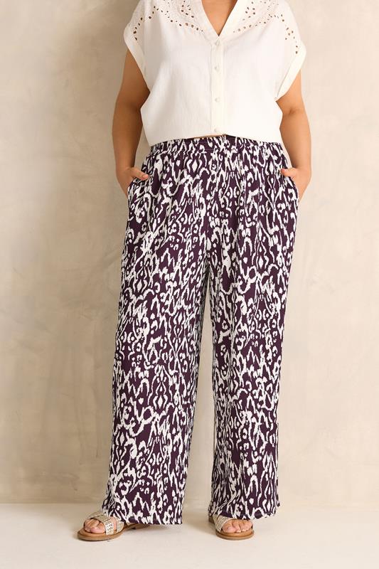 EVANS Plus Size Berry Red Ikat Print Shirred Waist Trousers | Evans 1