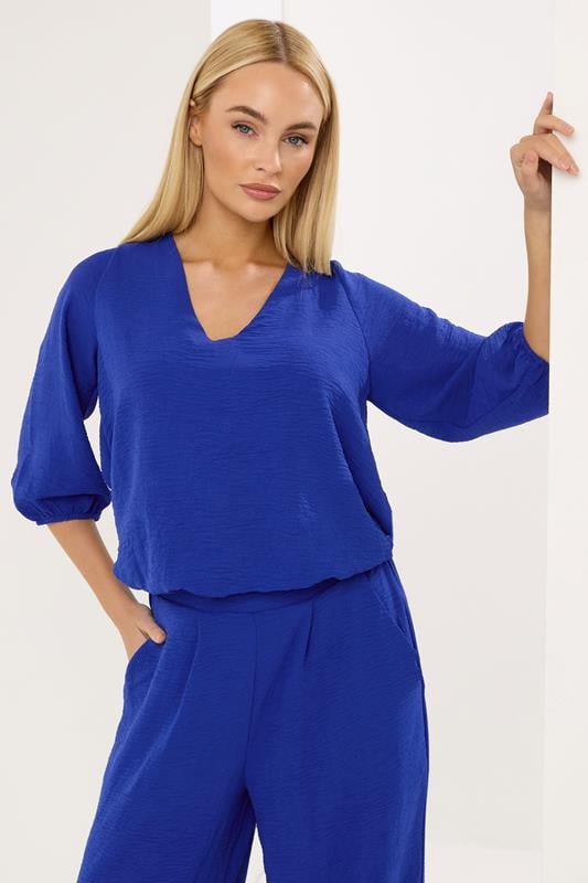  STAR Blue Bubble Hem Top