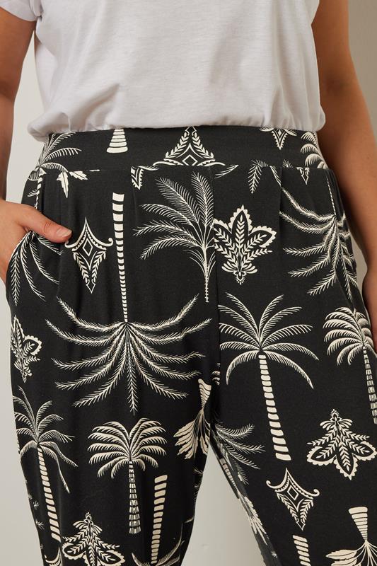 YOURS Plus Size Black Palm Print Balloon Trousers | Yours Clothing 2