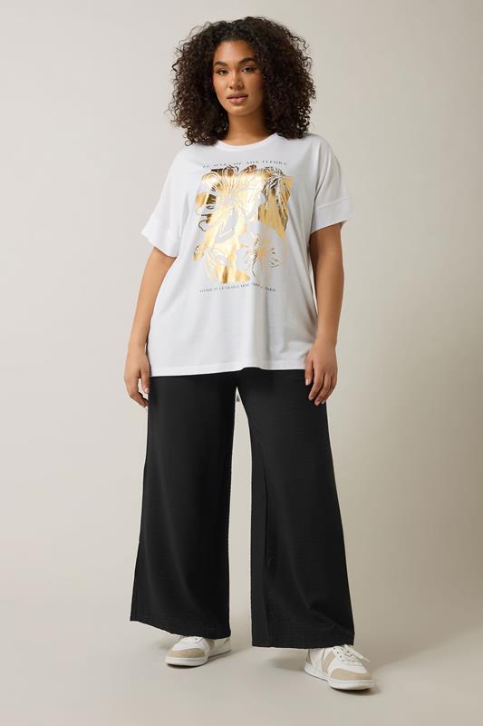 EVANS Plus Size Black Elasticated Waist Wide Leg Trousers | Evans 1