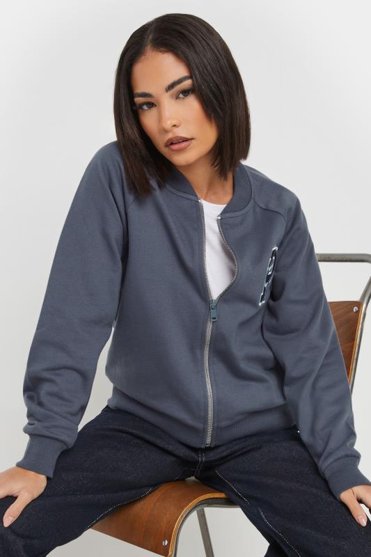 PixieGirl Petite Women's Blue Embroidered Initial Jersey Bomber Jacket | PixieGirl 1