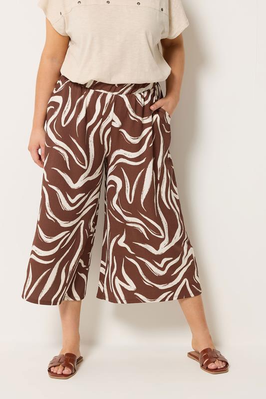 YOURS Curve Brown Abstract Cropped Wide Leg Trousers
