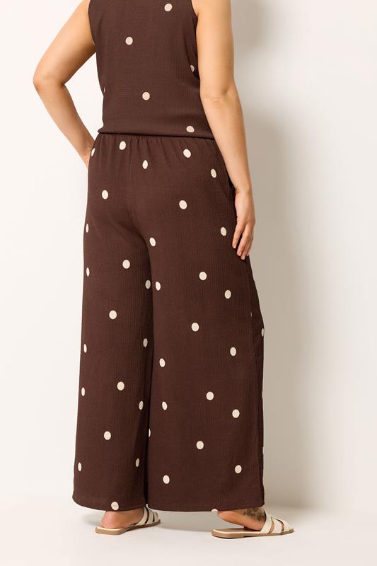 YOURS Plus Size Chocolate Brown Polka Dot Crinkle Trousers | Yours Clothing 2