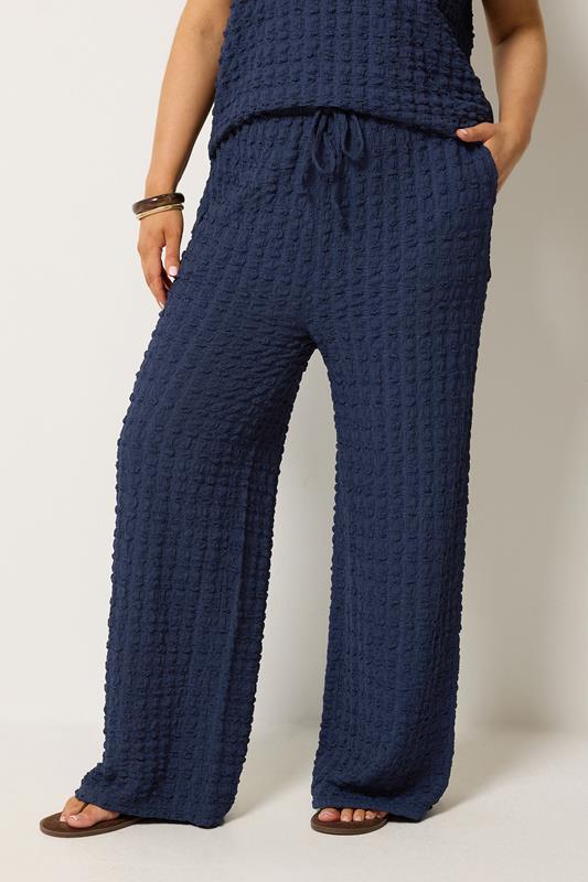 YOURS Curve Navy Blue Bubble Textured Wide Leg Trousers