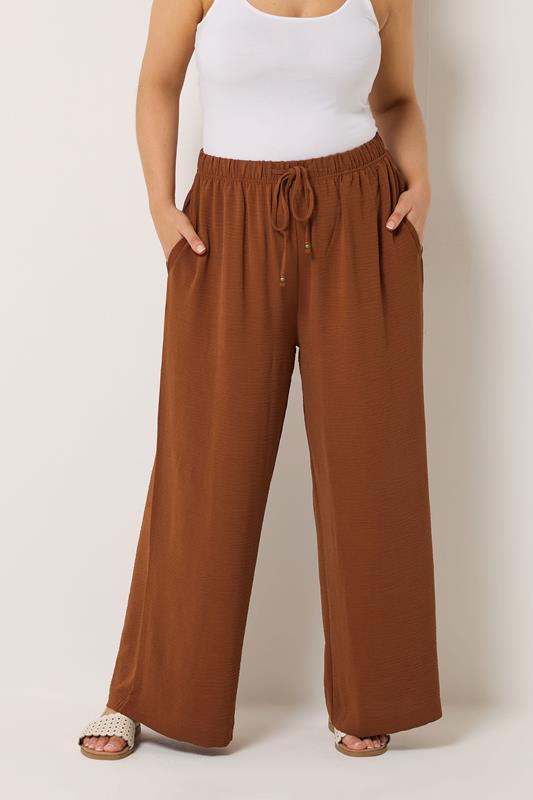 YOURS Plus Size Burnt Orange Wide Leg Trousers | Yours Clothing 1