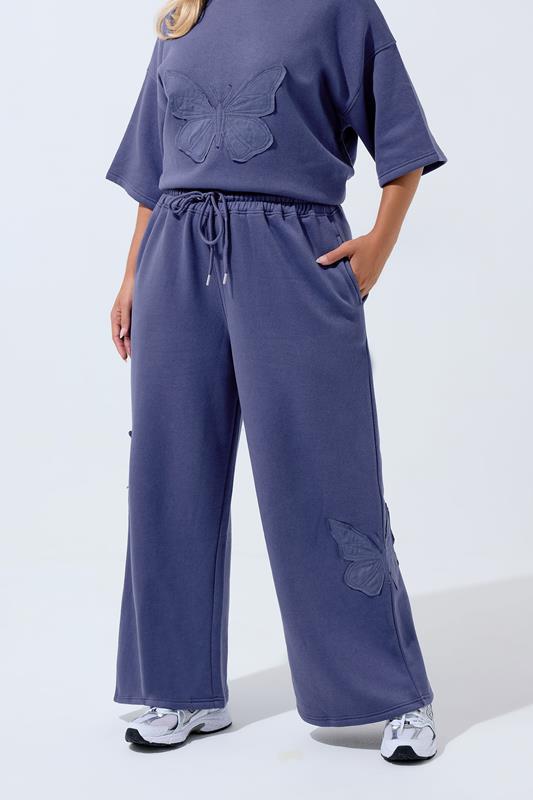 LIMITED COLLECTION Plus Size Navy Blue Embroidered Butterfly Wide Leg Joggers | Yours Clothing 1