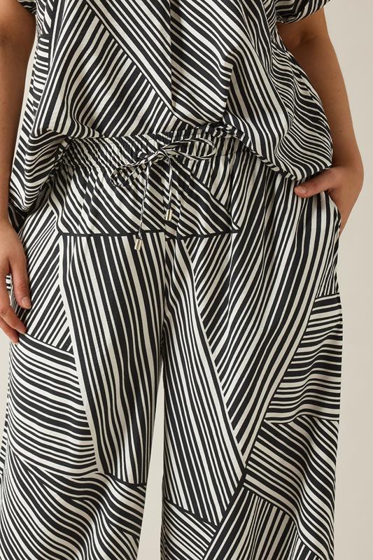 EVANS Plus Size Black Stripe Print Wide Leg Trousers | Evans 5