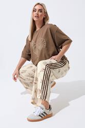 LIMITED COLLECTION Plus Size Nude Shell Print Wide Leg Trousers | Yours Clothing 1