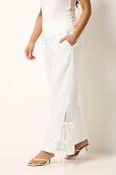 PixieGirl Petite Women's White Tie Detail Cotton Cheesecloth Wide Leg Trousers | PixieGirl 1