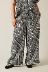 EVANS Plus Size Black Stripe Print Wide Leg Trousers | Evans 2