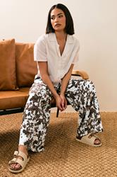 PixieGirl Petite Women's Brown Cow Print Wide Leg Trousers | PixieGirl 1