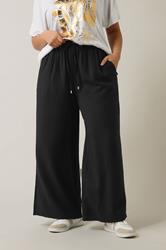 EVANS Plus Size Black Elasticated Waist Wide Leg Trousers | Evans 2