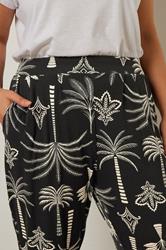 YOURS Plus Size Black Palm Print Balloon Trousers | Yours Clothing 2