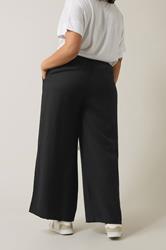 EVANS Plus Size Black Elasticated Waist Wide Leg Trousers | Evans 4