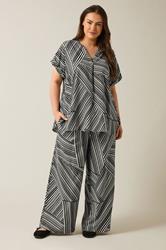 EVANS Plus Size Black Stripe Print Wide Leg Trousers | Evans 1