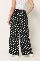 M&Co Petite Black & White Polka Dot Wide Leg Trousers | M&Co 2