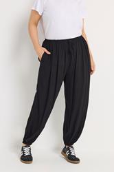 YOURS Plus Size Black Cuffed Balloon Trousers | Yours Clothing 1