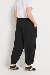 YOURS Plus Size Black Cuffed Balloon Trousers | Yours Clothing 2