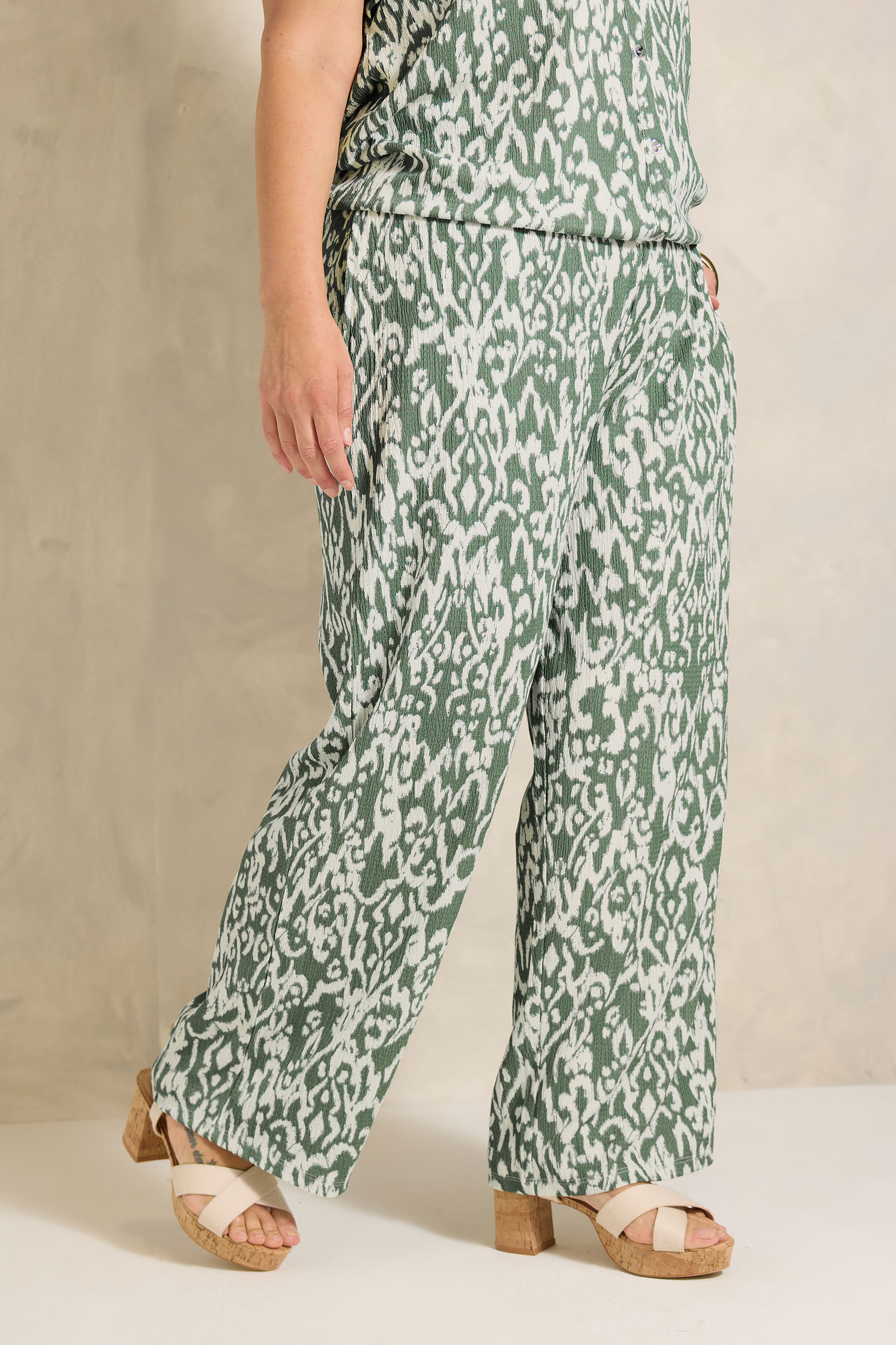 EVANS Plus Size Khaki Green Aztec Print Wide Leg Trouser | Evans 1