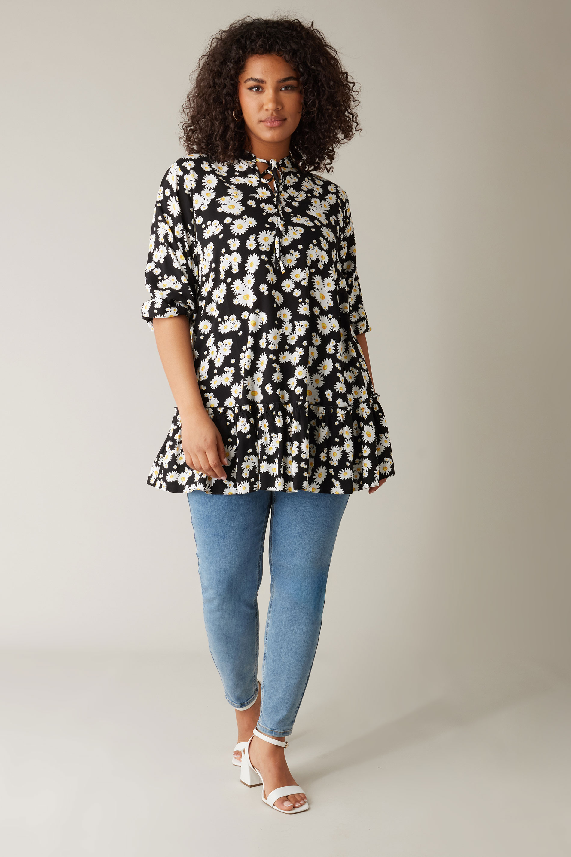 EVANS Plus Size Black Daisy Print Frill Hem Tunic Top | Evans 1