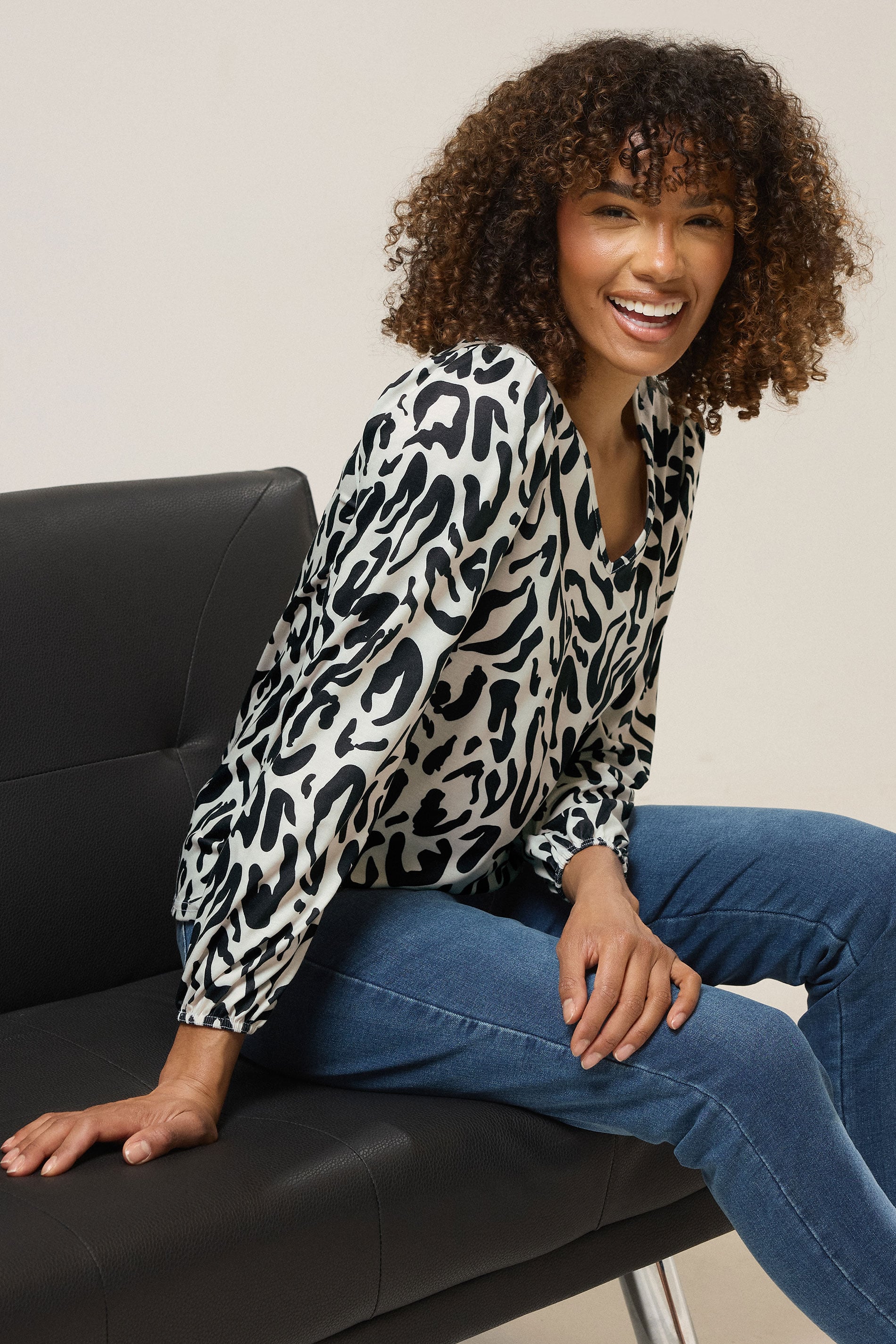 M&Co Ivory White Animal Print Long Sleeve V-Neck Top | M&Co 1