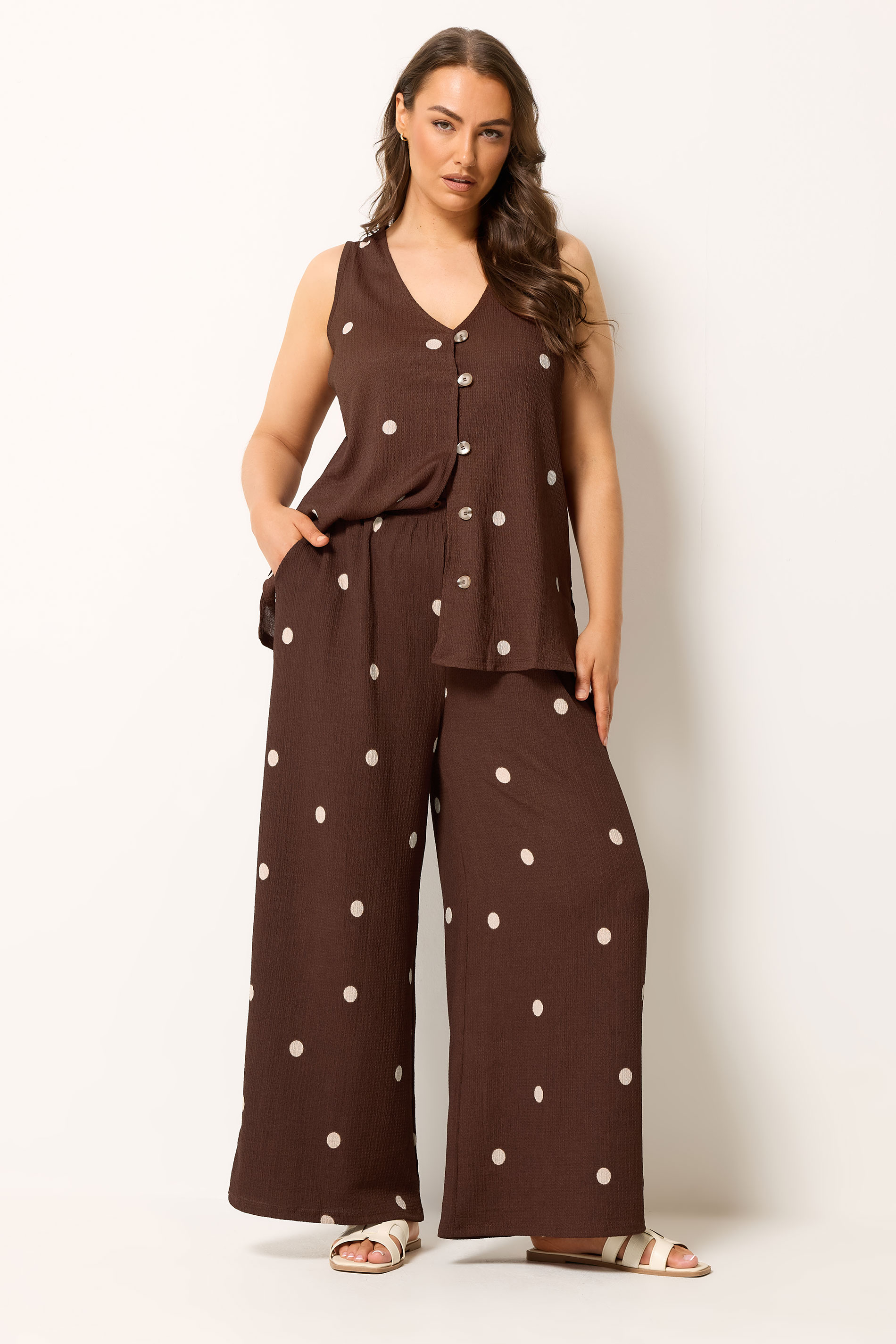 YOURS Plus Size Chocolate Brown Polka Dot Crinkle Trousers | Yours Clothing 1