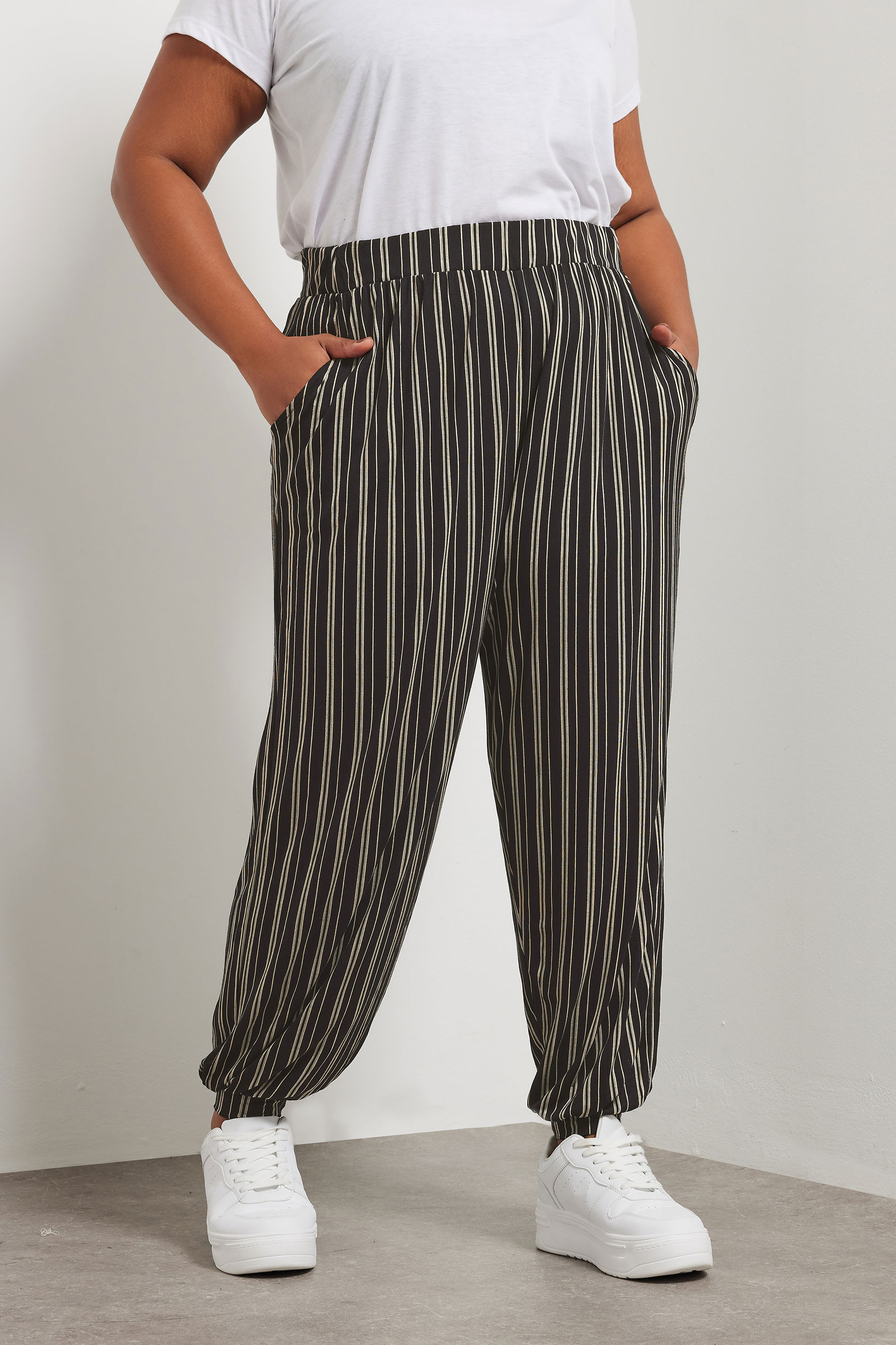 YOURS Plus Size Black Striped Jersey Cuffed Trousers | Yours Clothing 2